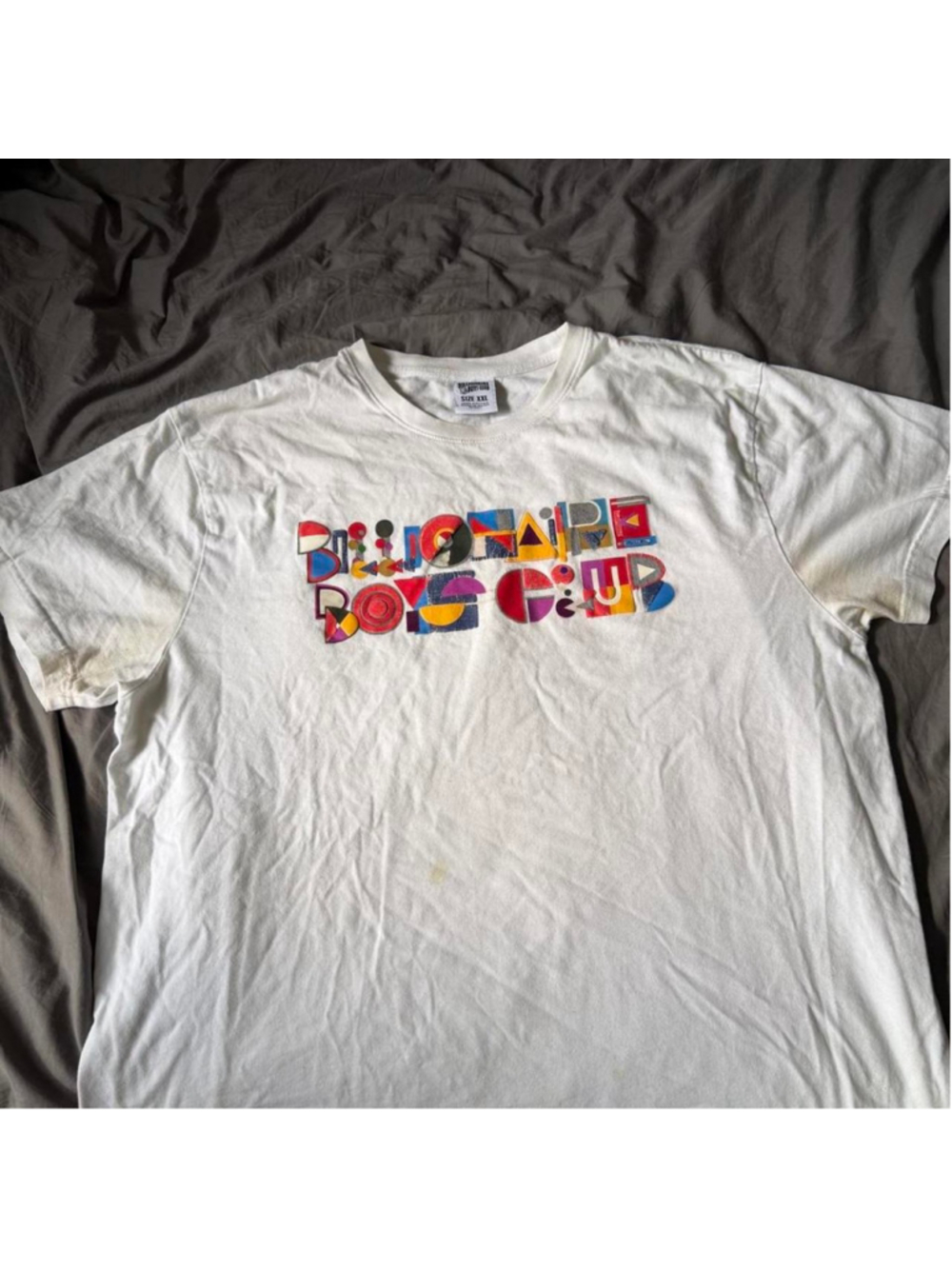 White Billionaire Boys Club tee with multicolored 'BILLIONAIRE BOYS CLUB' small